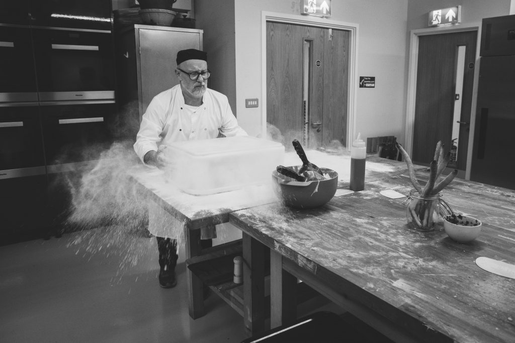 Baking Chef Removing Dough